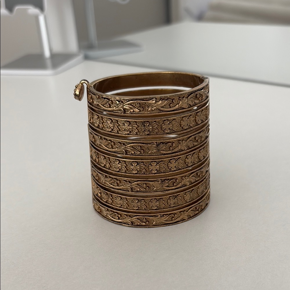 Juicy couture Gold Floral Bangle/cuffling Bracelet